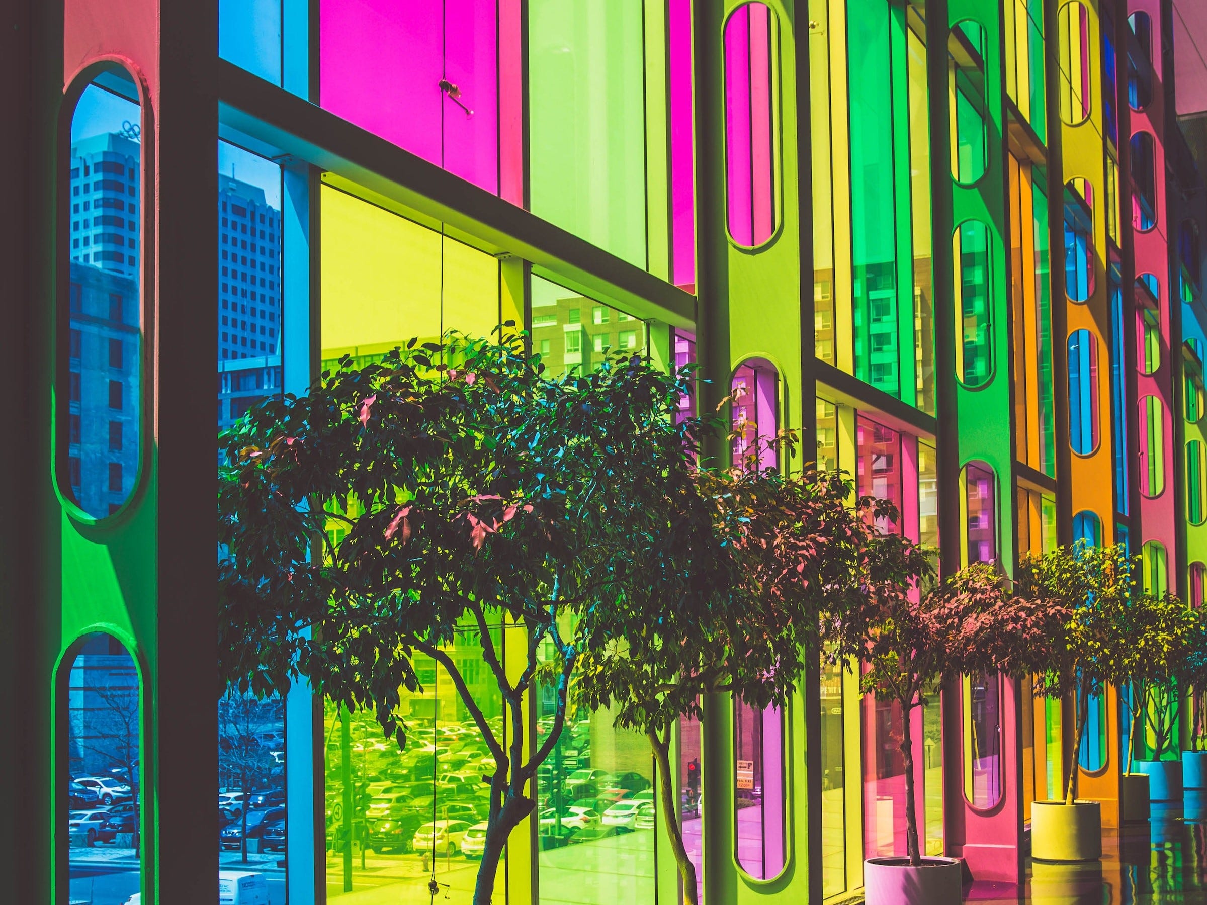 These colored windows remind me of the layers of CNNs and their filters. Image source: unsplash.com.