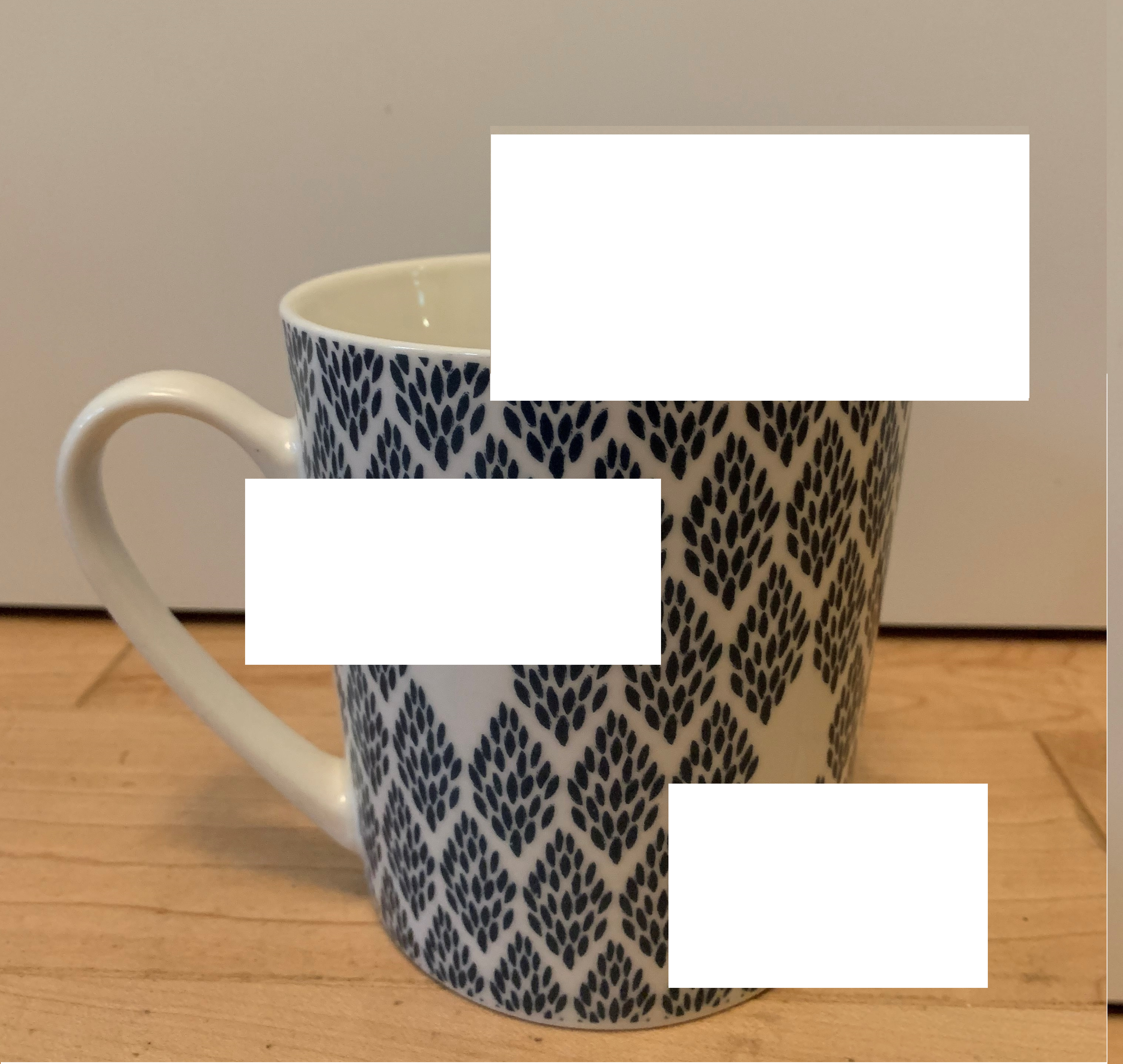 Image of a mug with 3 areas masked out.